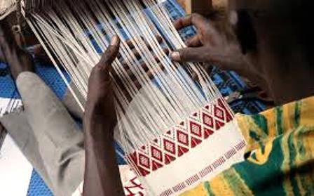 man-weaving-fabric